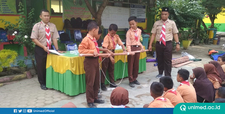 Tim PKM Dosen UNIMED Beri Pelatihan Bagi Kegiatan Ekskul Pramuka di SDN Dolok Masihul